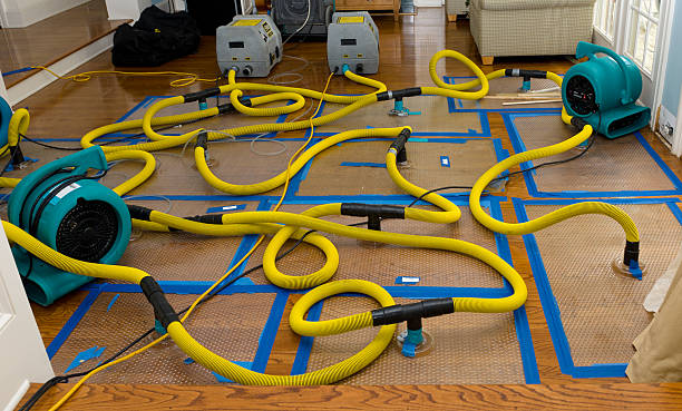 Professional Storm Water Damage Restoration technician working in Matthews, GA